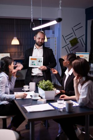 business-entrepreneur-man-presenting-company-statistics-using-tablet-financial-presentation business-entrepreneur-man-presenting-company-statistics-using-tablet-financial-presentation