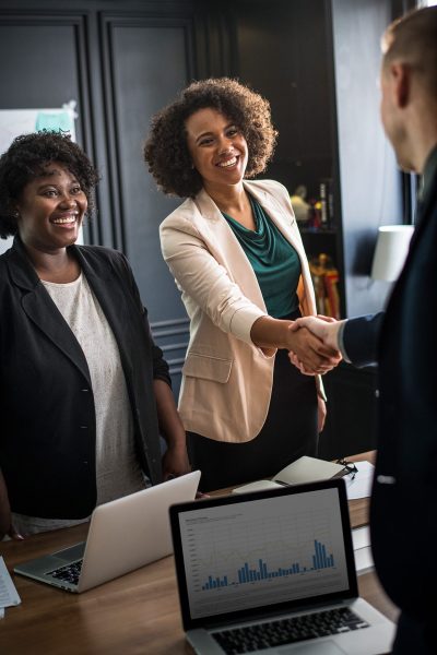 business-partners-shaking-hands-agreement business-partners-shaking-hands-agreement